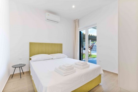 Sevid - novi dvosobni apartman s vrtom i zajedničkim bazenom, 76 m2